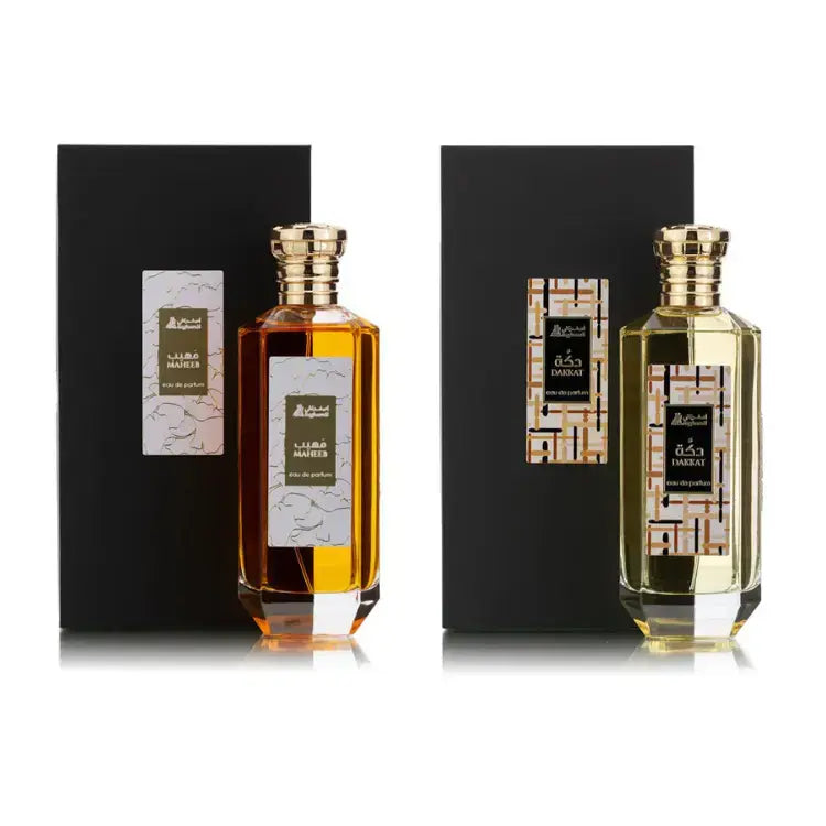 Asgharali luxury perfume bottles in elegant gold and amber glass packaging with black and gold boxes.